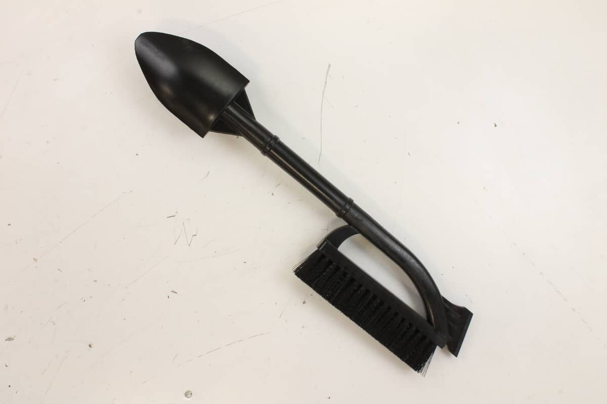 This is a genuine Ariens 03901400 DEVICE- SNOW CLEAN OUT W/BRUSH
