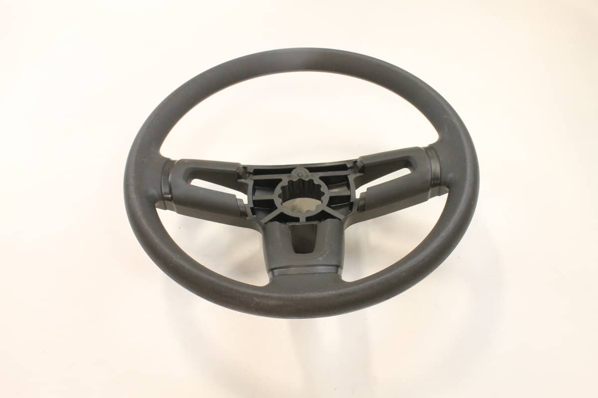This is a genuine Ariens 21546664 WHEEL.STEERING.HARD RIM.BLACK