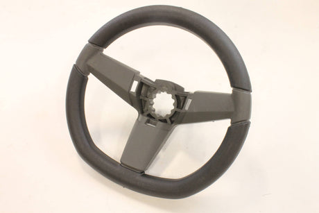 This is a genuine Husqvarna 532439740 WHEEL, STEERING